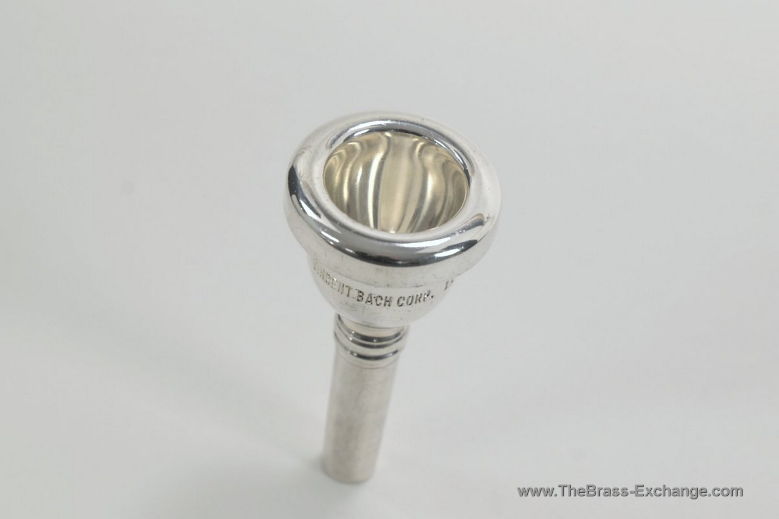 Bach Corporation 11 small shank trombone mouthpiece – cup view, vintage silver finish