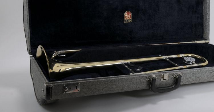 trombone in open case condition evaluation for value assessment