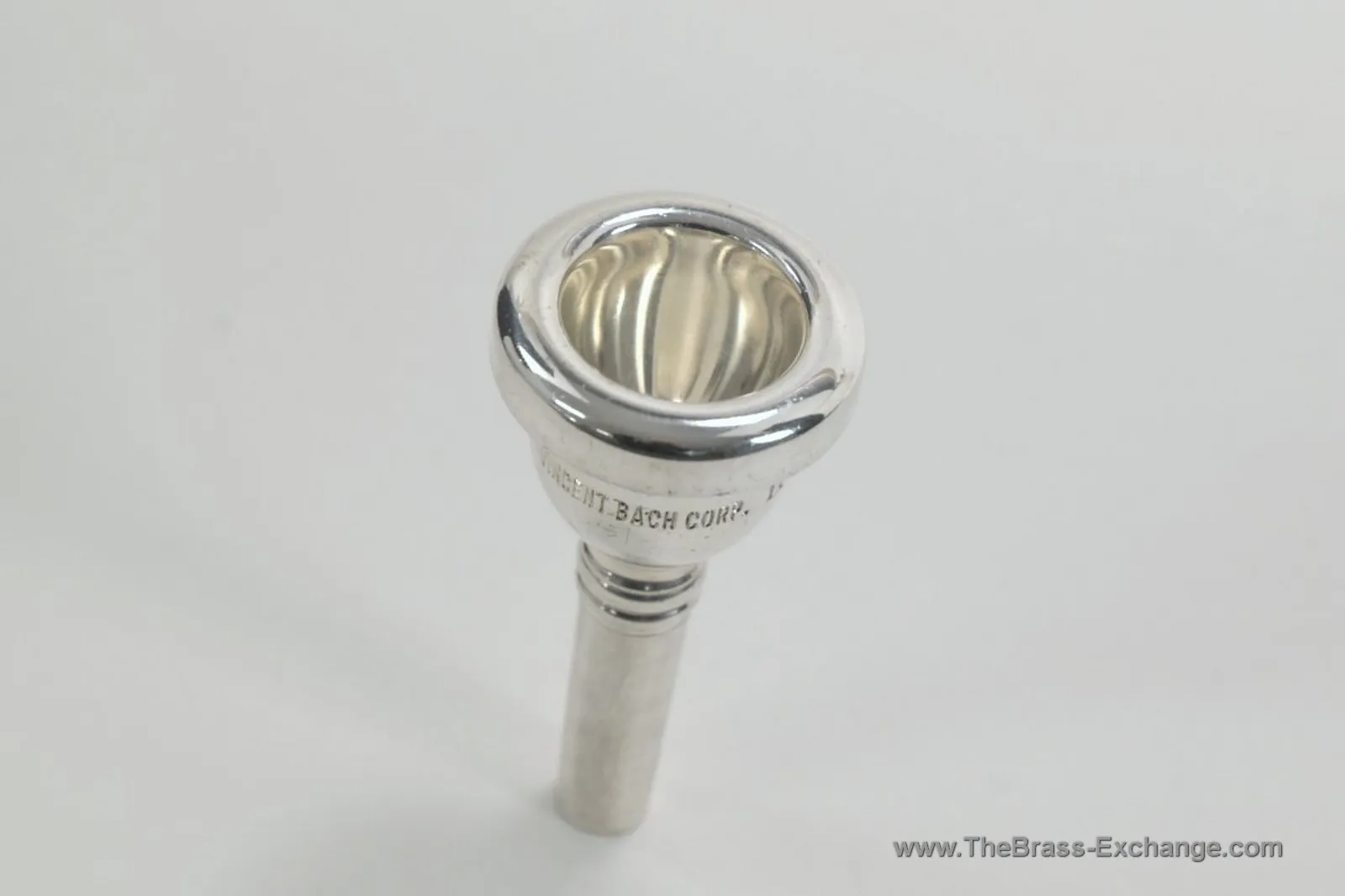 Bach Corporation 11 small shank trombone mouthpiece – cup view, vintage silver finish
