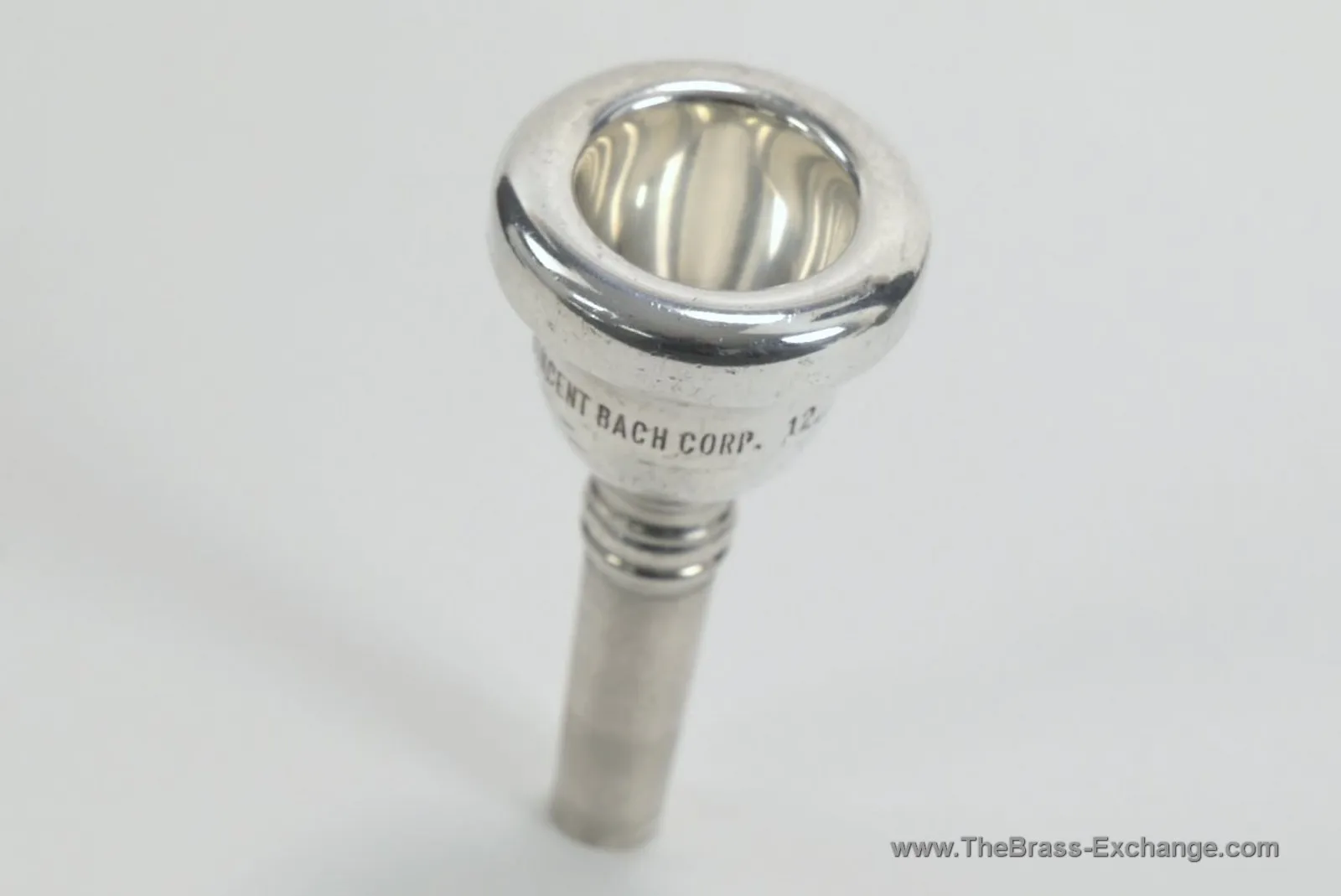 Bach Corporation 12 small shank trombone mouthpiece – cup view, vintage silver finish