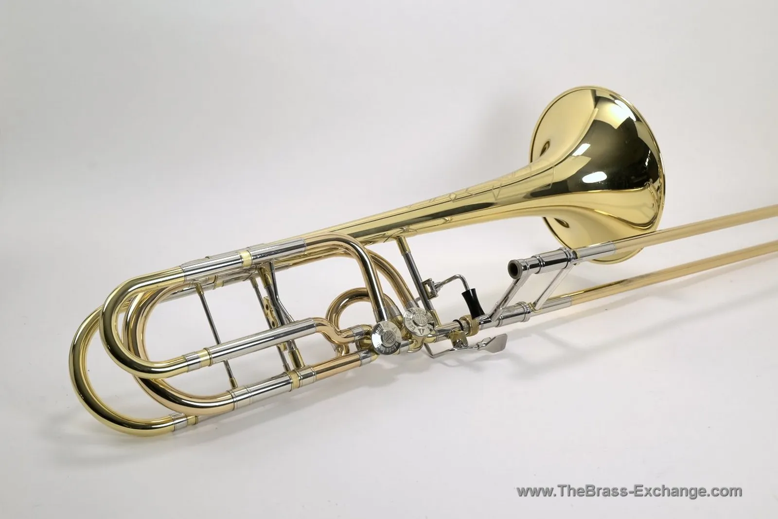 Edwards B502-I AR bass trombone, right-side profile showing independent AR-1 valves, rose brass outer slide tubes, and standard-weight handslide.