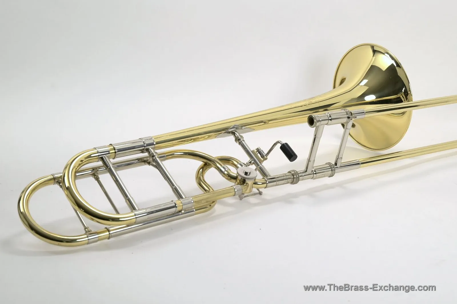Used S.E. Shires Q30YR professional tenor trombone with floral-engraved 8.5-inch yellow brass bell, TY tuning slide, and QTW47 handslide in excellent playing condition